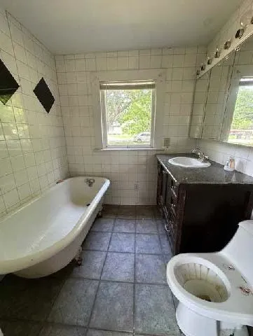 a bathroom with a sink and bathtub
