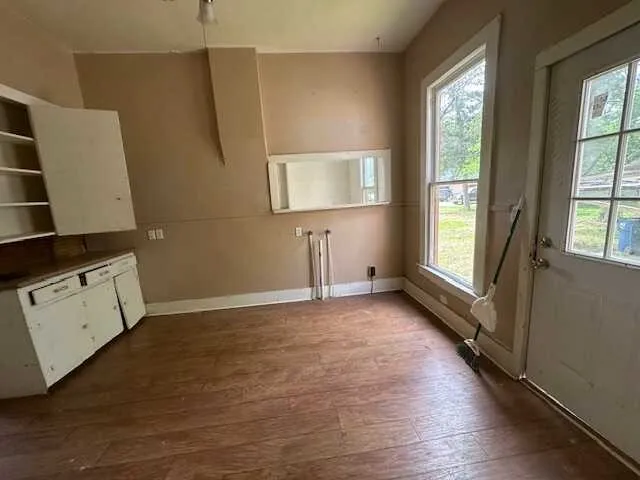 a view of an empty room with a window