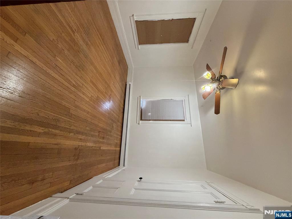 64 Knickerbocker Road, Unit 2 2 Englewood, NJ 07631 - Photo 18 of 27 wooden floor in an empty room with a window