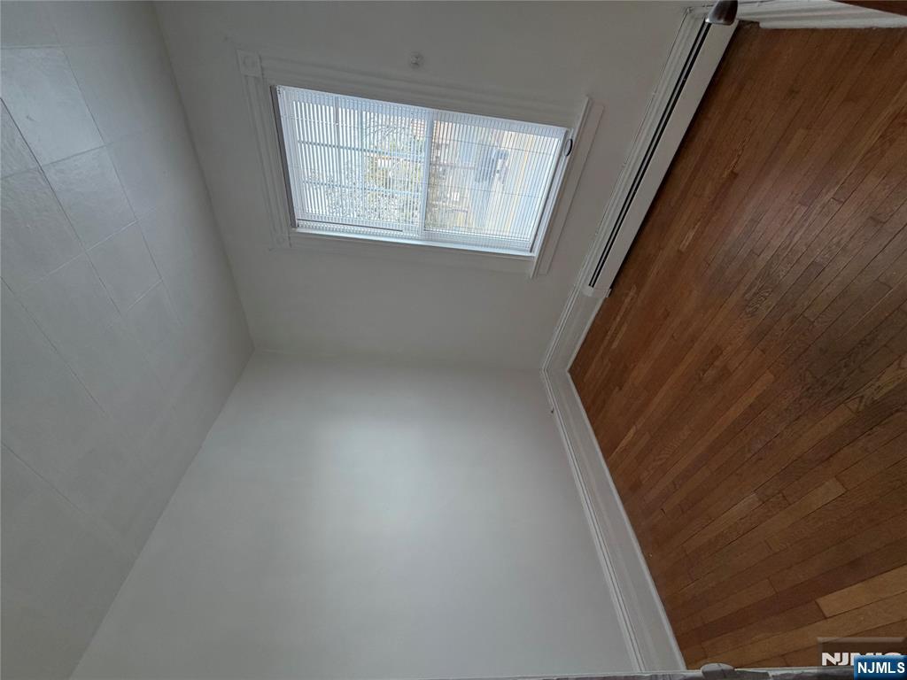 64 Knickerbocker Road, Unit 2 2 Englewood, NJ 07631 - Photo 19 of 27 an empty room with a window