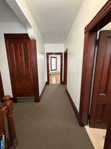 a view of empty room with front door
