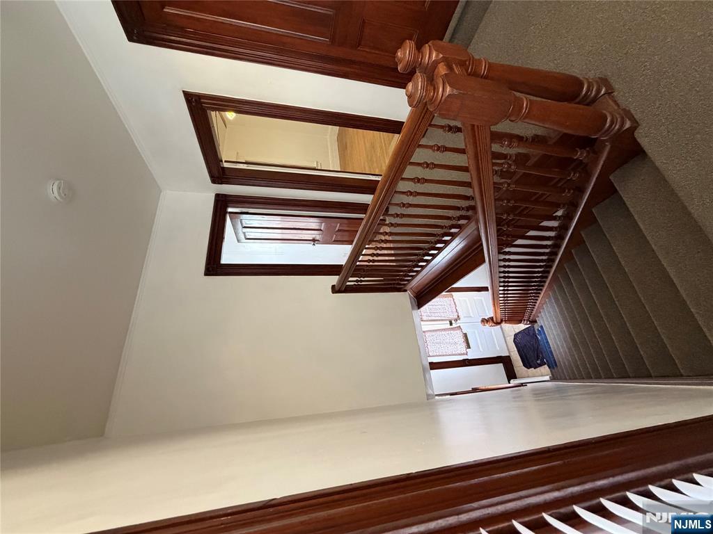 64 Knickerbocker Road, Unit 2 2 Englewood, NJ 07631 - Photo 23 of 27 a view of staircase with furniture and a window