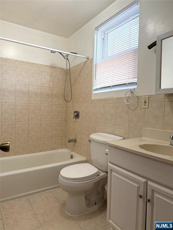 64 Knickerbocker Road, Unit 2 2 Englewood, NJ 07631 - Photo 24 of 27 a bathroom with a sink a toilet and a bathtub