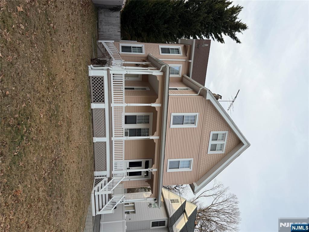 64 Knickerbocker Road, Unit 2 2 Englewood, NJ 07631 - Photo 27 of 27 a front view of a house with a yard