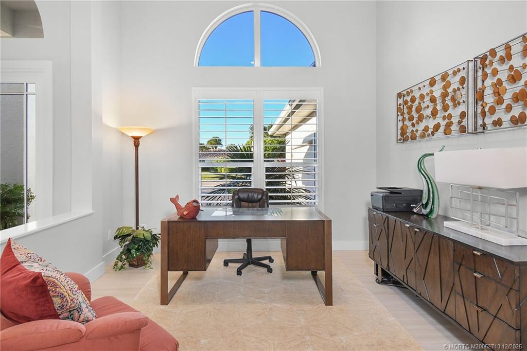 8149 Southeast Double Tree Drive Hobe Sound, FL 33455 - Photo 22 of 61 a living room with furniture