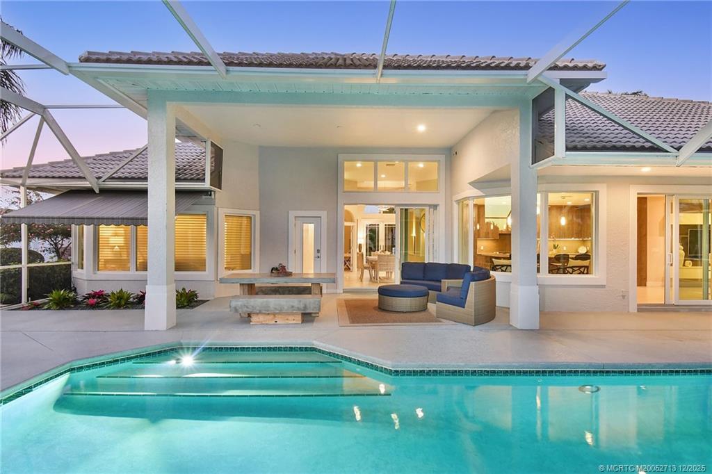 8149 Southeast Double Tree Drive Hobe Sound, FL 33455 - Photo 3 of 61 a lobby with furniture and window
