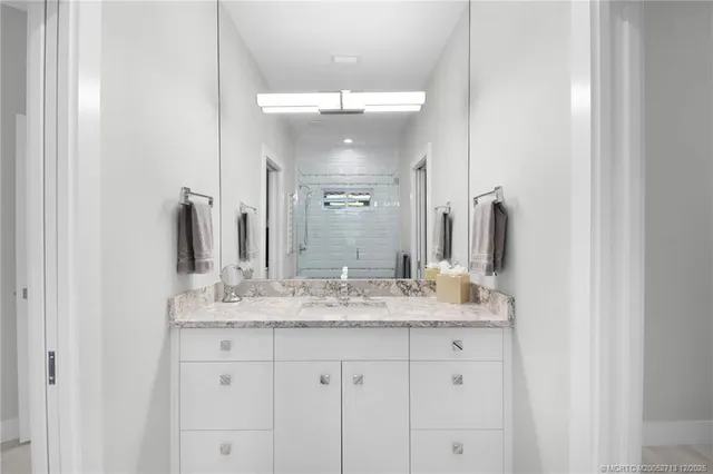 a view of a patio with couches and chairs