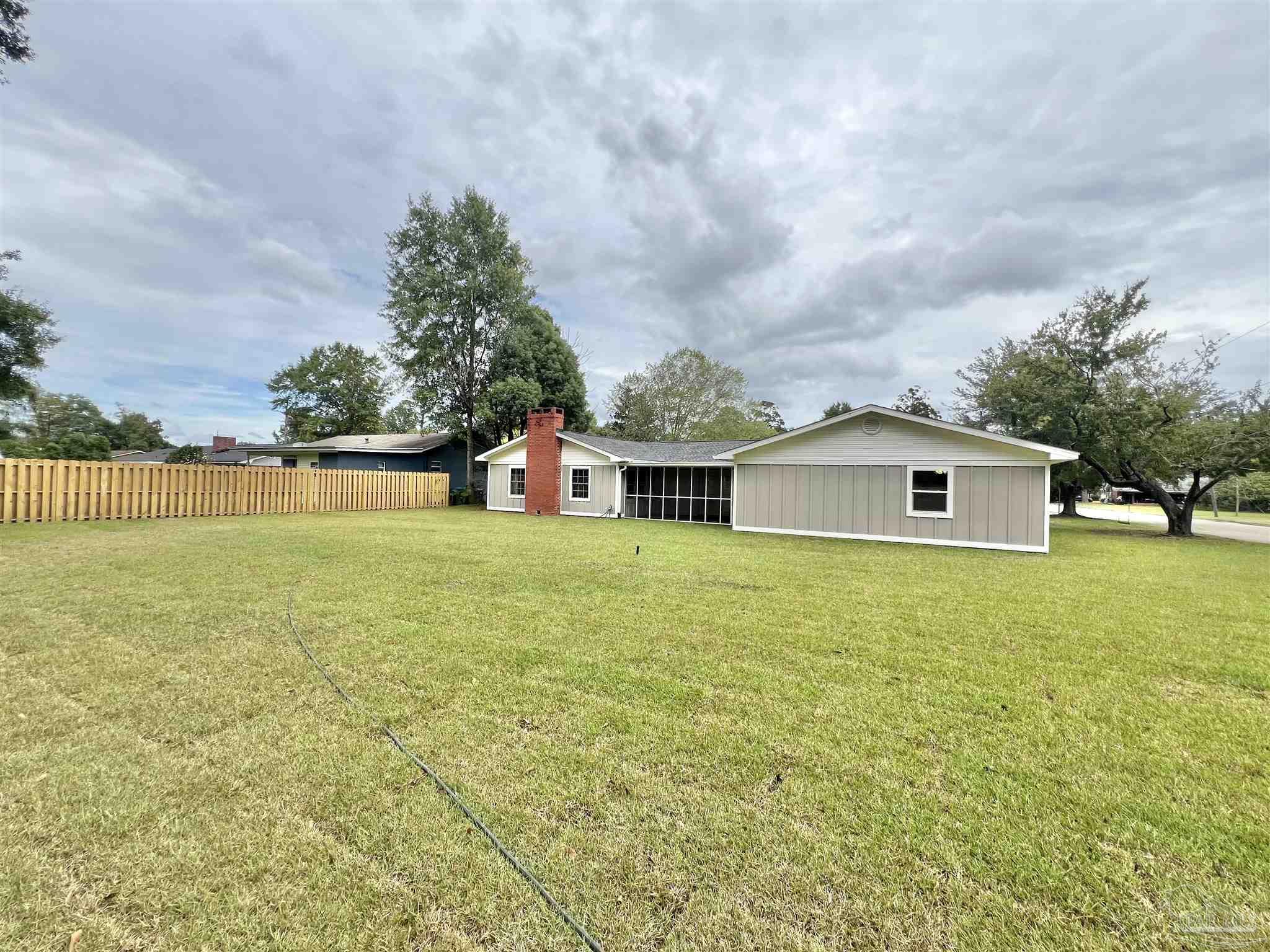 618 South Carney Street Atmore, AL 36502 - Photo 39 of 39 a front view of a house with a yard