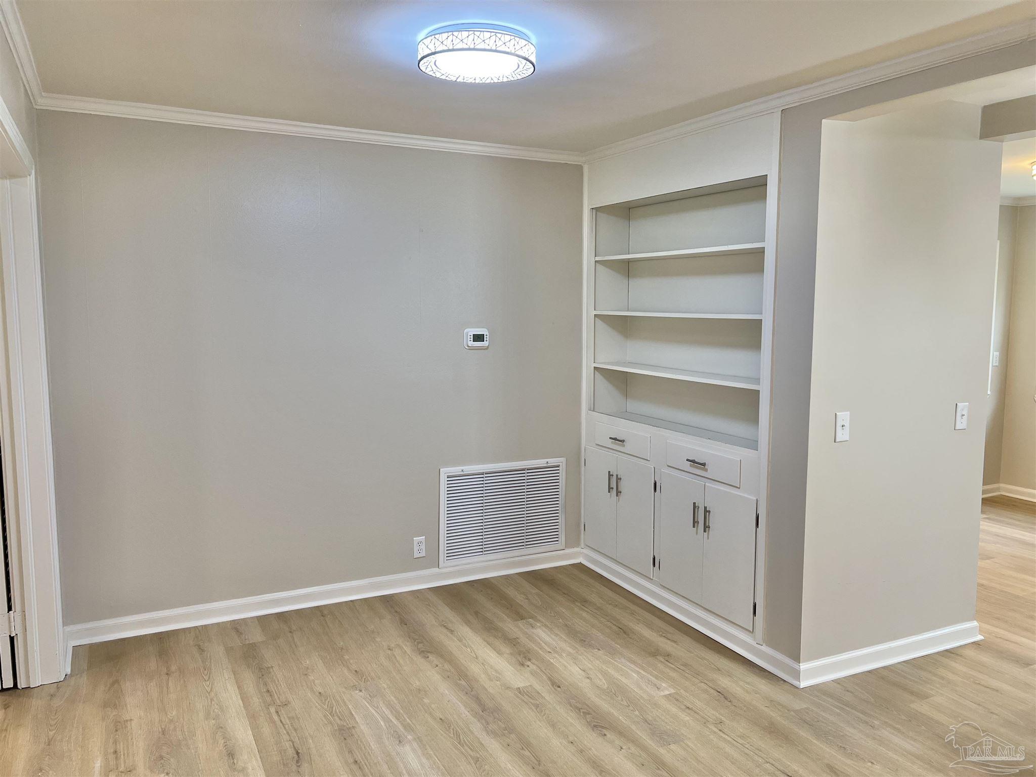 618 South Carney Street Atmore, AL 36502 - Photo 6 of 39 a view of an empty walk in closet