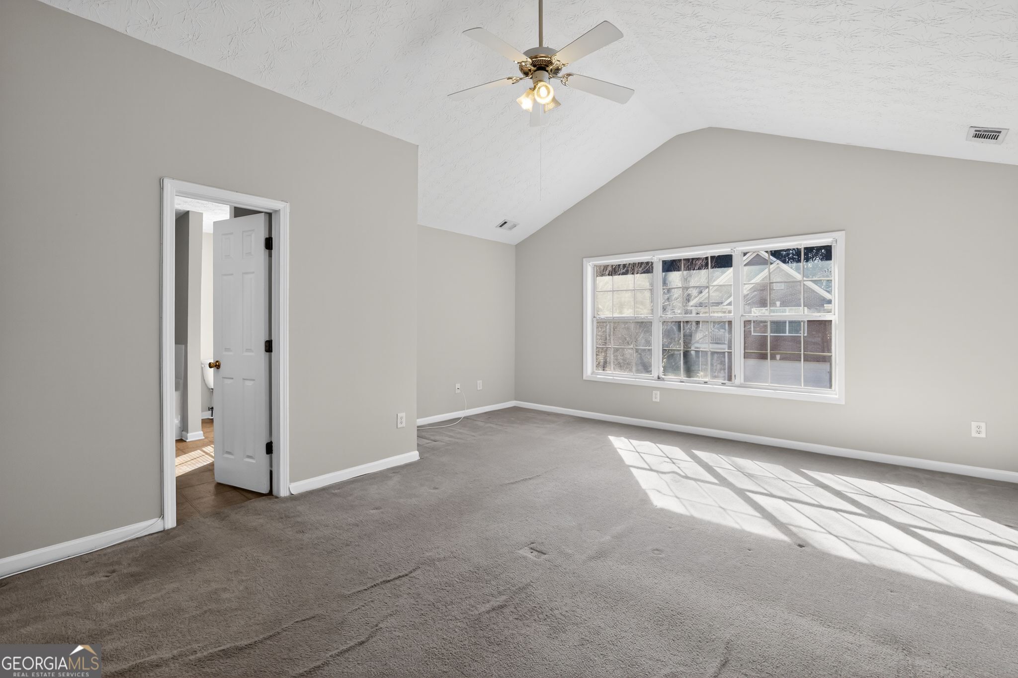 6256 Lake Valley Point Lithonia, GA 30058 - Photo 18 of 33 a view of an empty room with a window