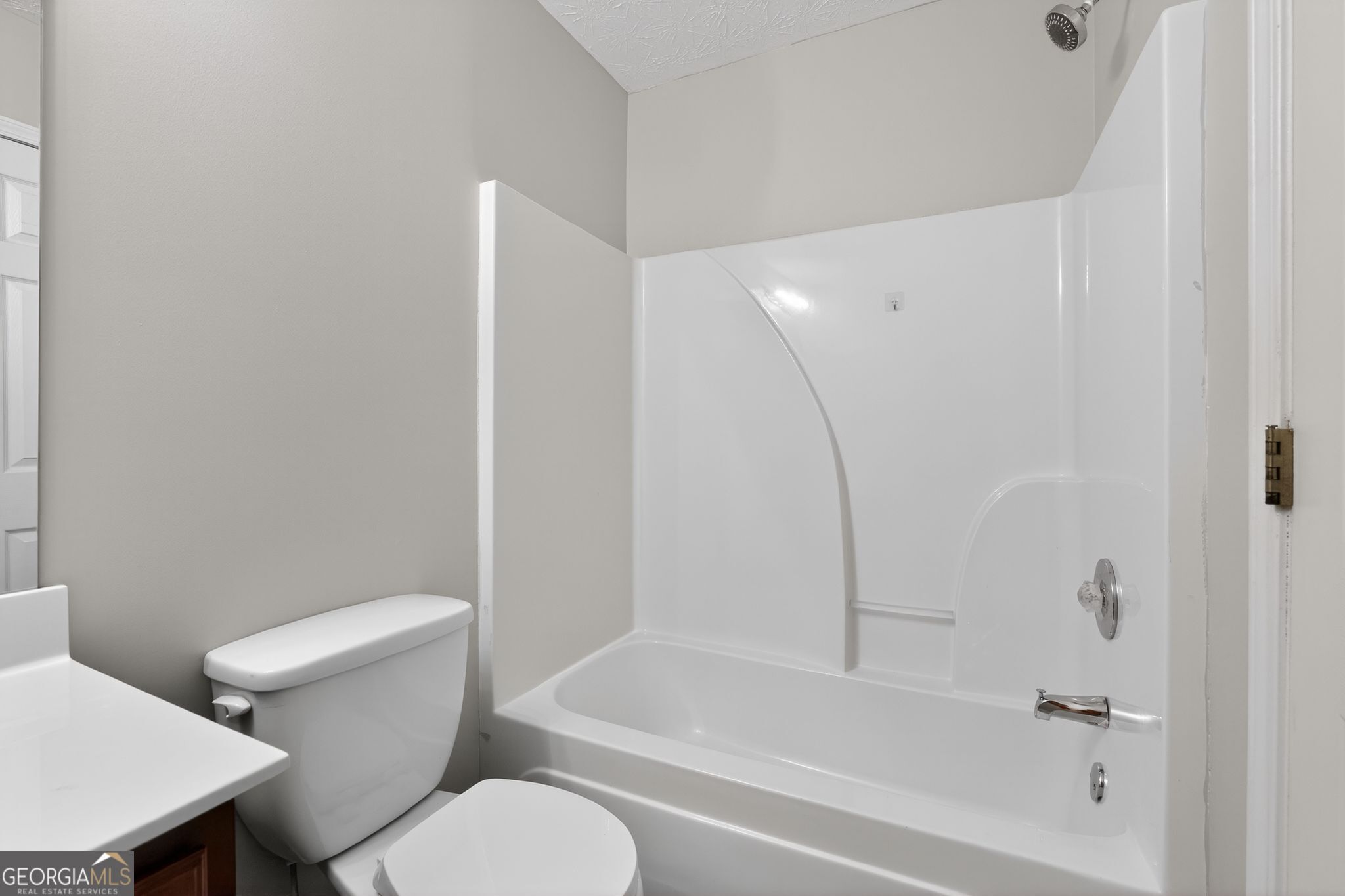 6256 Lake Valley Point Lithonia, GA 30058 - Photo 20 of 33 a bathroom with a toilet and a bathtub