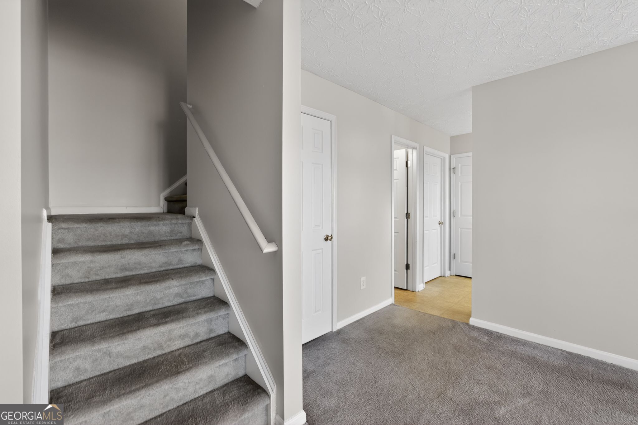 6256 Lake Valley Point Lithonia, GA 30058 - Photo 25 of 33 a view of entryway with stairs