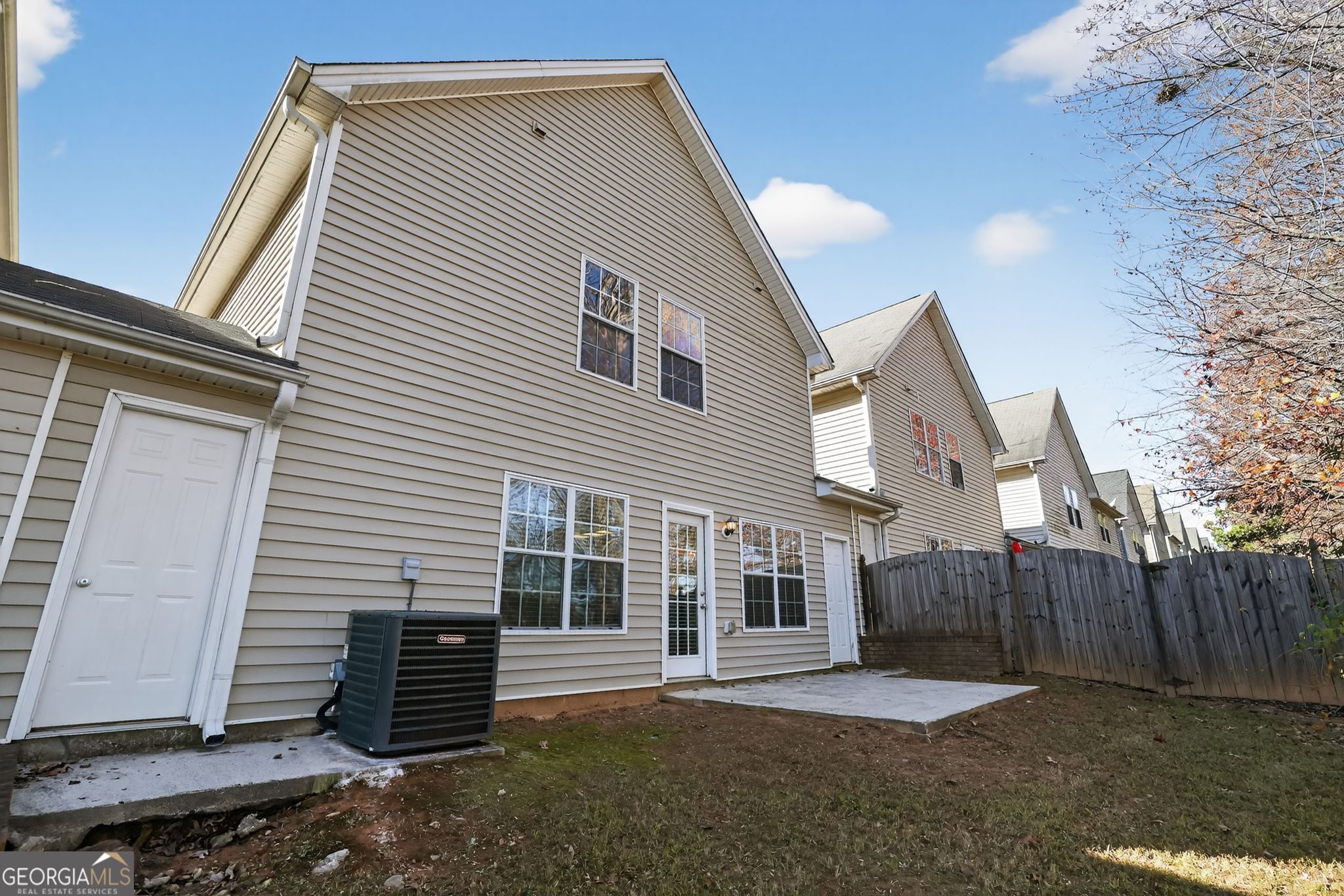 6256 Lake Valley Point Lithonia, GA 30058 - Photo 28 of 33 a view of a house with a yard
