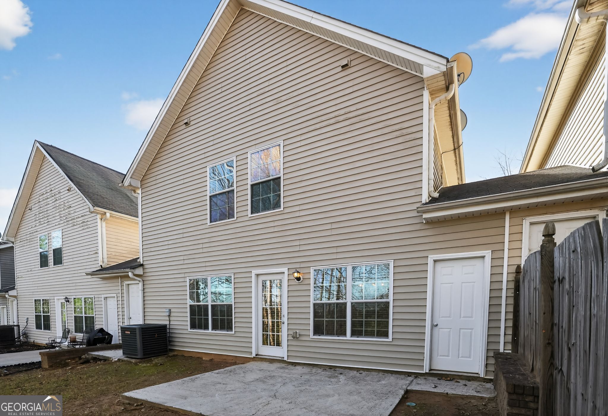 6256 Lake Valley Point Lithonia, GA 30058 - Photo 29 of 33 a view of a house with a patio