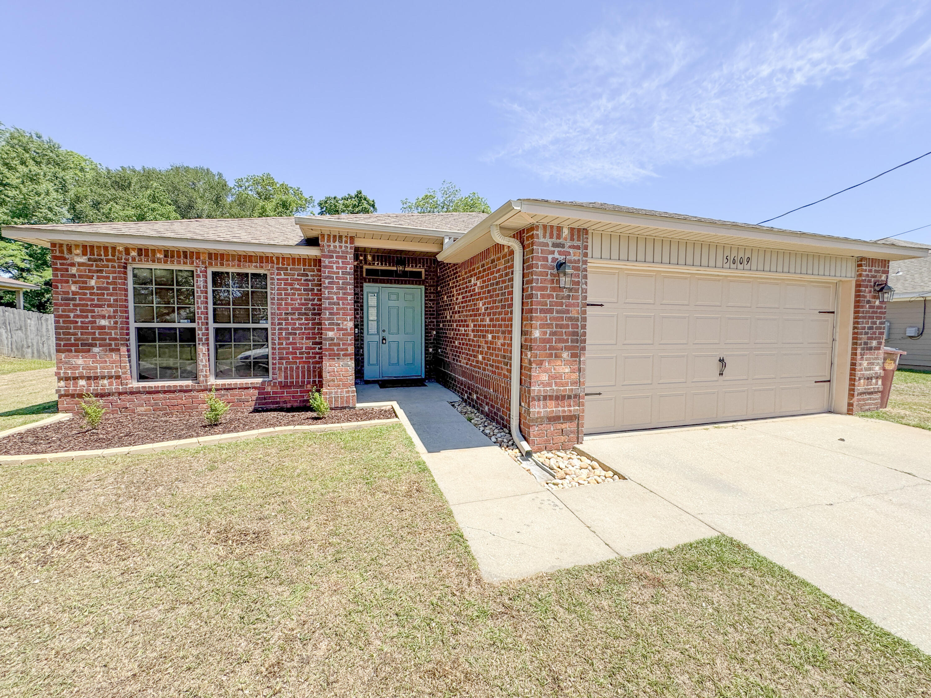 5609 Price Plantation Road Baker, FL 32531 - Photo 2 of 49 a view of backyard of house