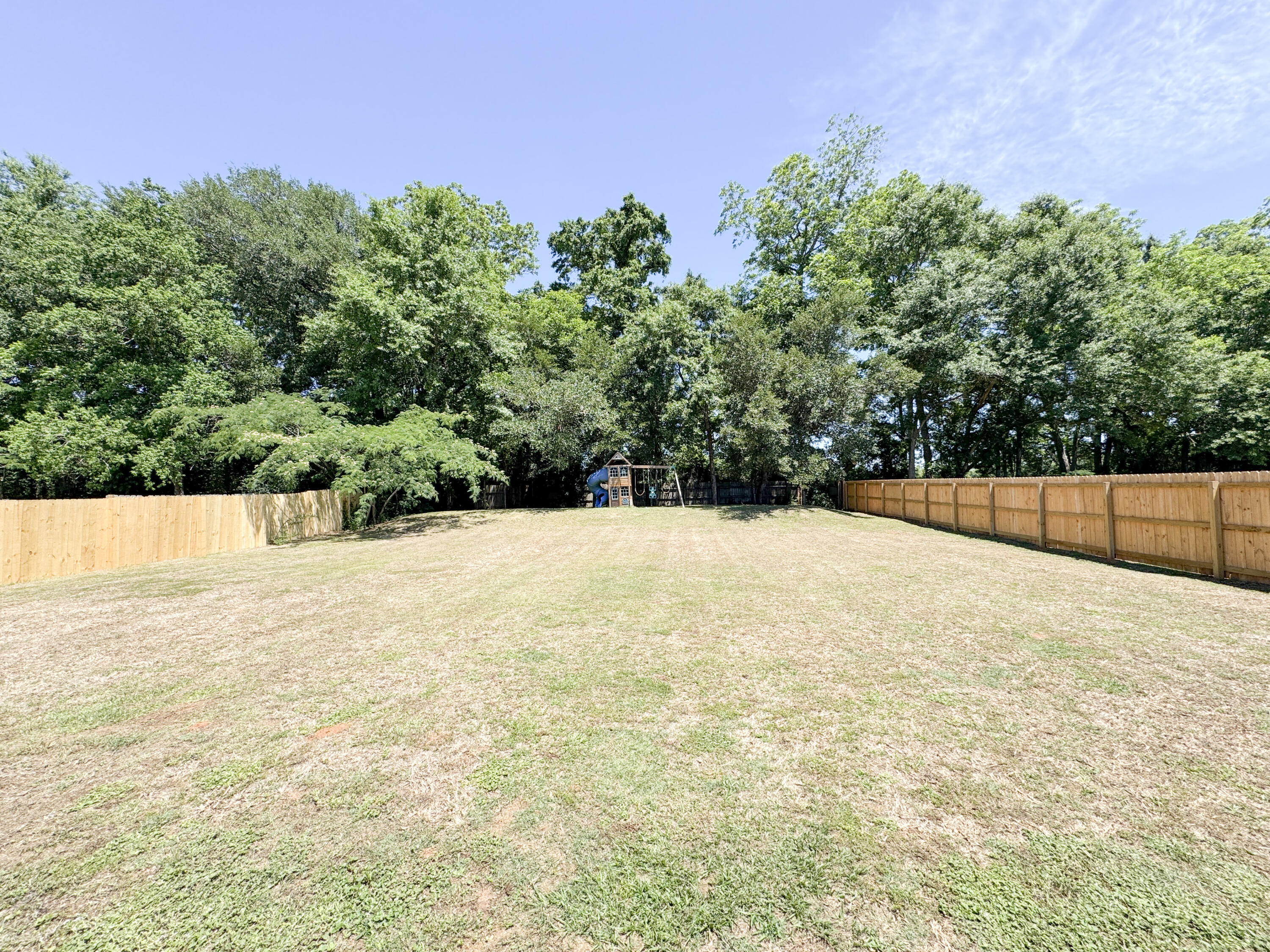 5609 Price Plantation Road Baker, FL 32531 - Photo 32 of 49 a view of a backyard of the house