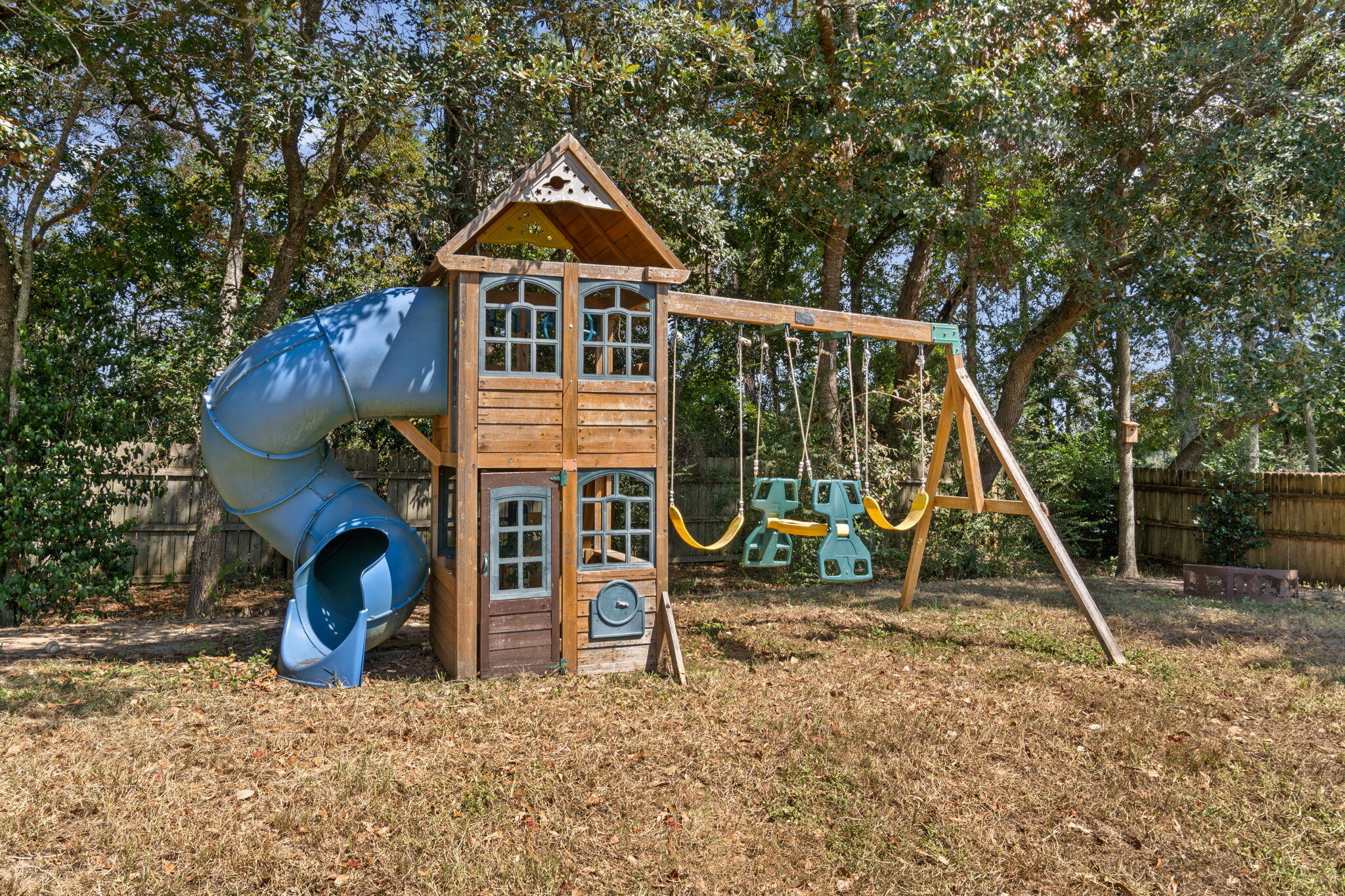 5609 Price Plantation Road Baker, FL 32531 - Photo 35 of 49 a front view of a house with garden