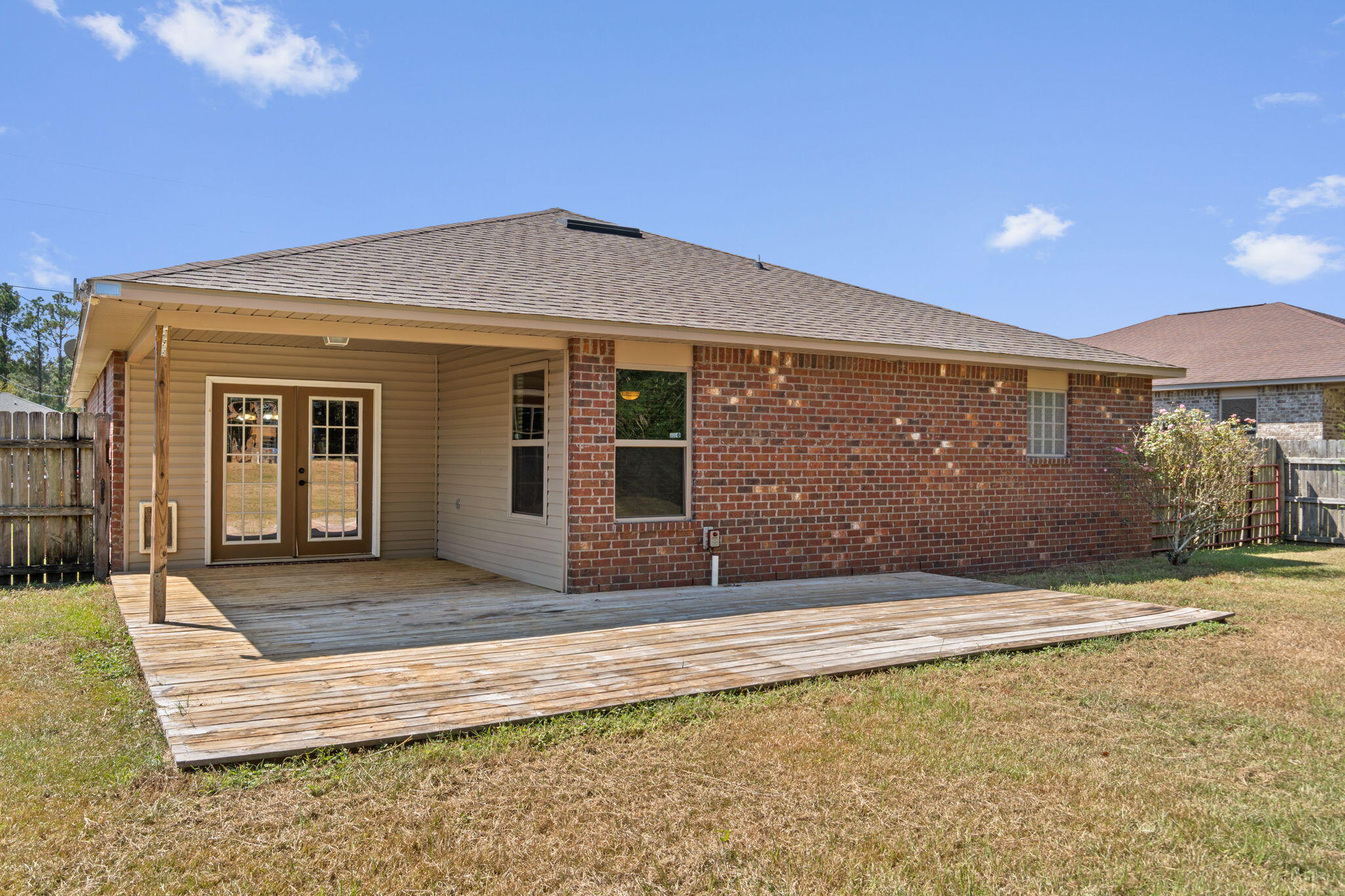 5609 Price Plantation Road Baker, FL 32531 - Photo 37 of 49 a front view of a house with porch