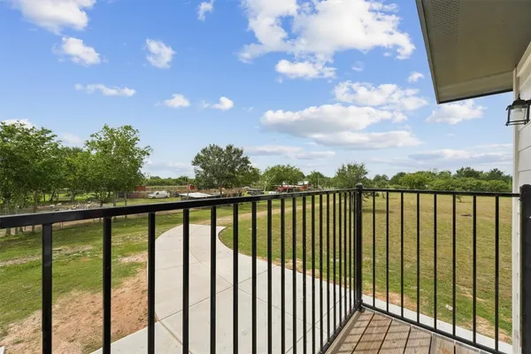 a view of a balcony with a lake