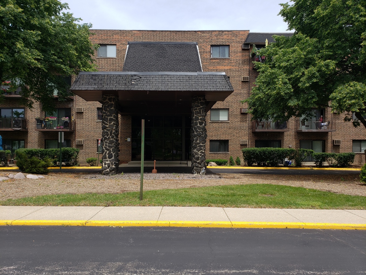 239 North Mill Road, Unit 111 Addison, IL 60101 - Photo 1 of 18 a view of a house with swimming pool and a yard