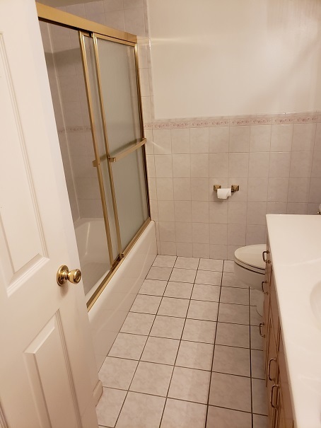 239 North Mill Road, Unit 111 Addison, IL 60101 - Photo 13 of 18 a bathroom with a sink and a vanity