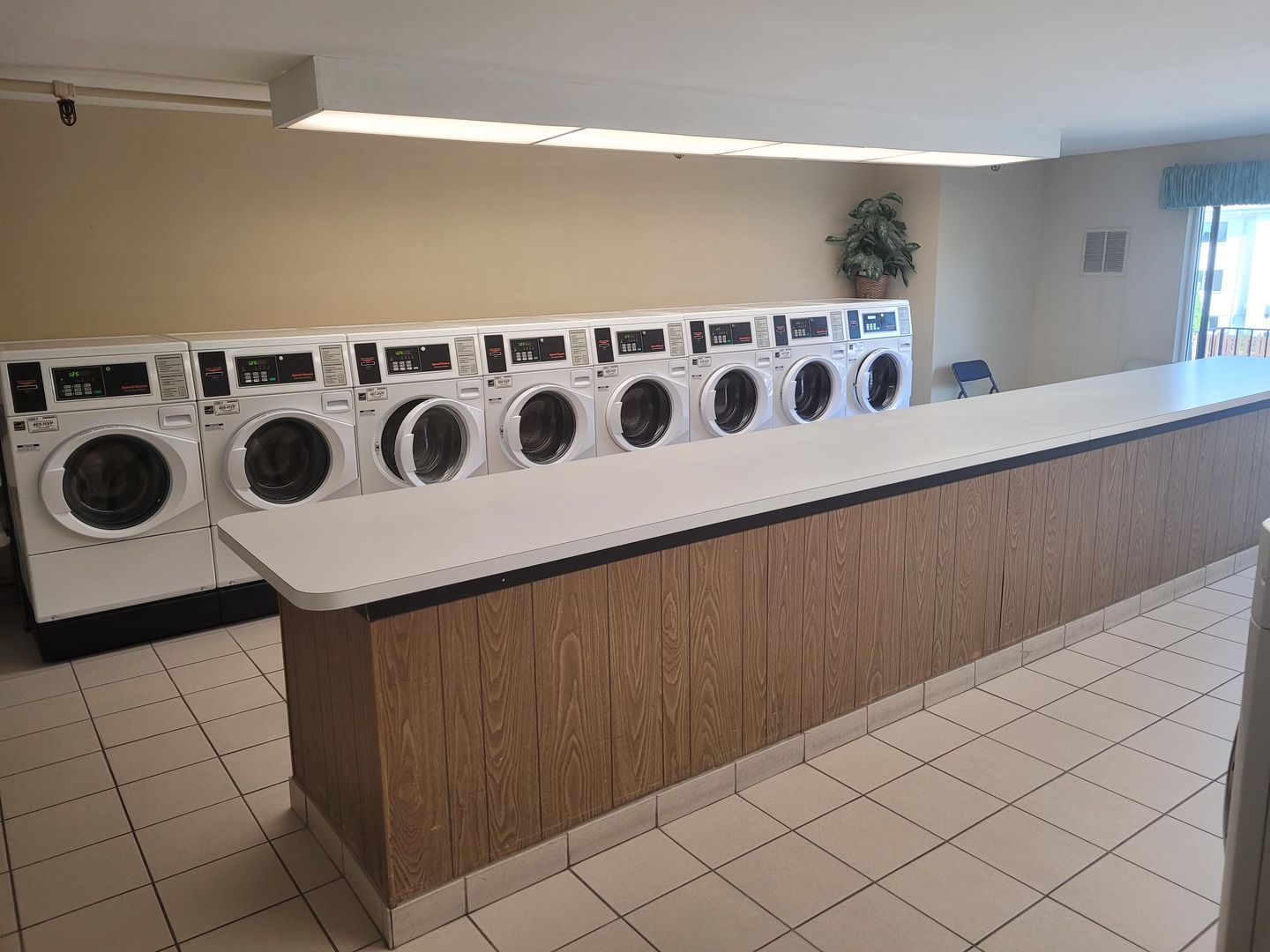 239 North Mill Road, Unit 111 Addison, IL 60101 - Photo 16 of 18 a utility room with dryer and washer