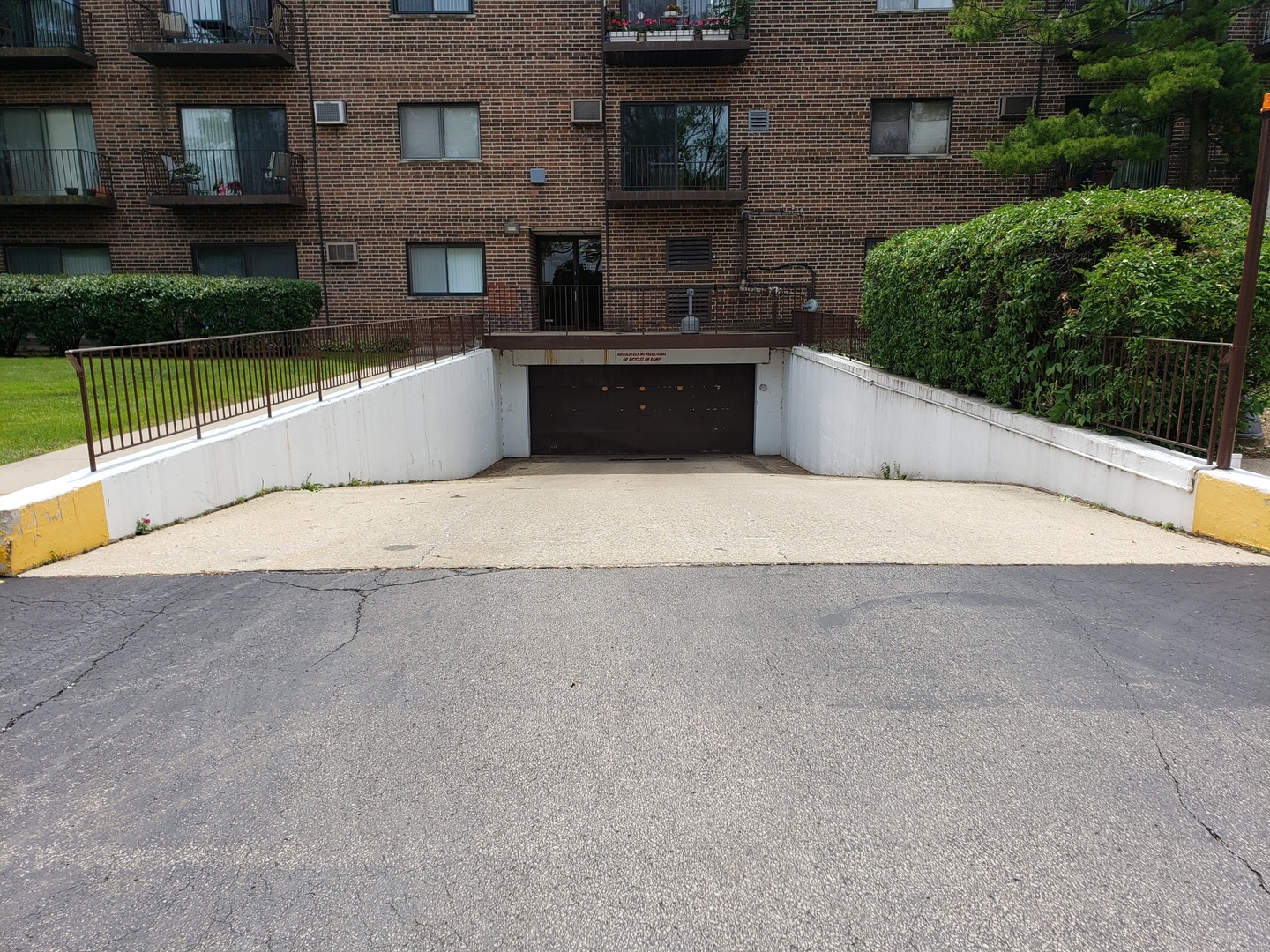 239 North Mill Road, Unit 111 Addison, IL 60101 - Photo 3 of 18 a view of backyard with outdoor seating and plants
