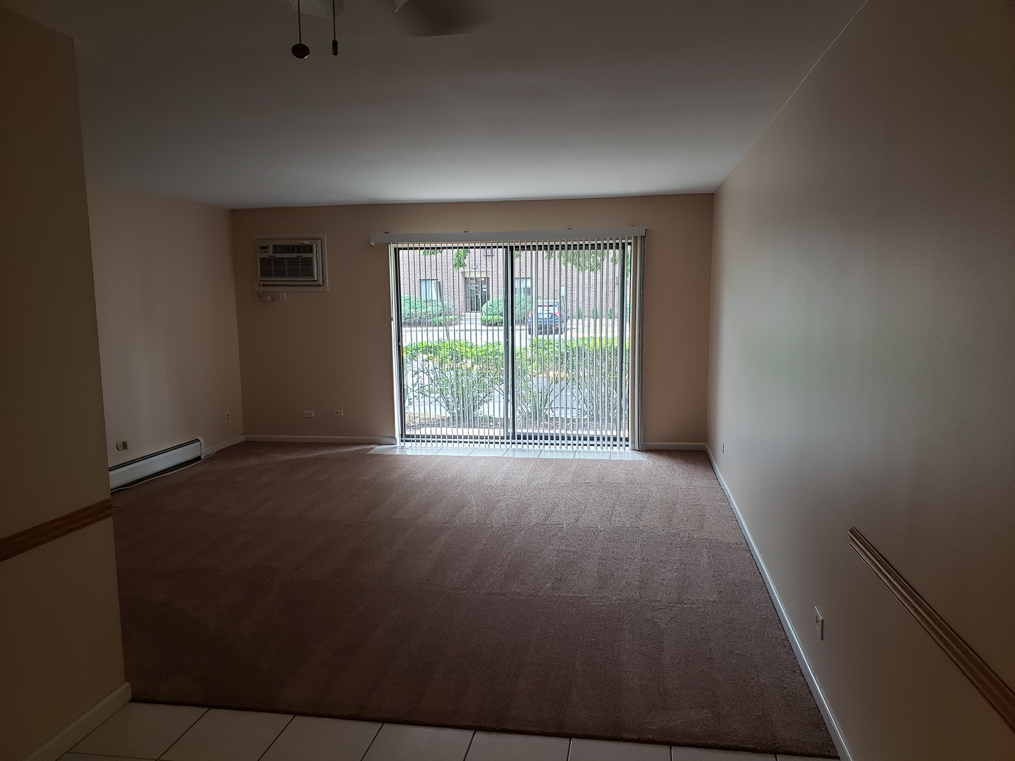 239 North Mill Road, Unit 111 Addison, IL 60101 - Photo 5 of 18 an empty room with windows