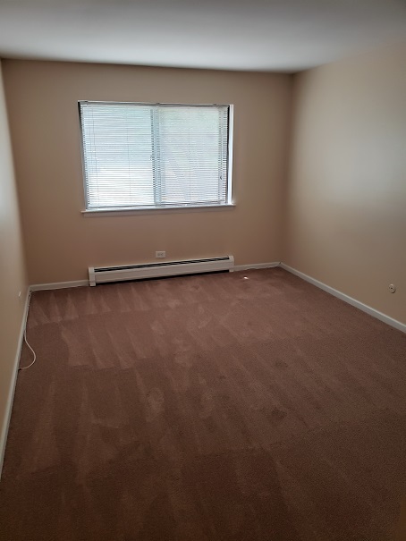 239 North Mill Road, Unit 111 Addison, IL 60101 - Photo 8 of 18 an empty room with a window