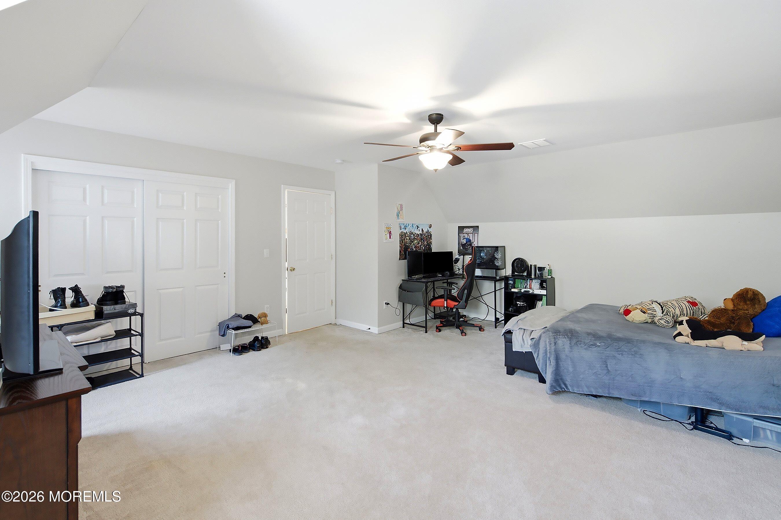 935 Bethel Church Road Jackson, NJ 08527 - Photo 24 of 32 a living room with furniture and a flat screen tv