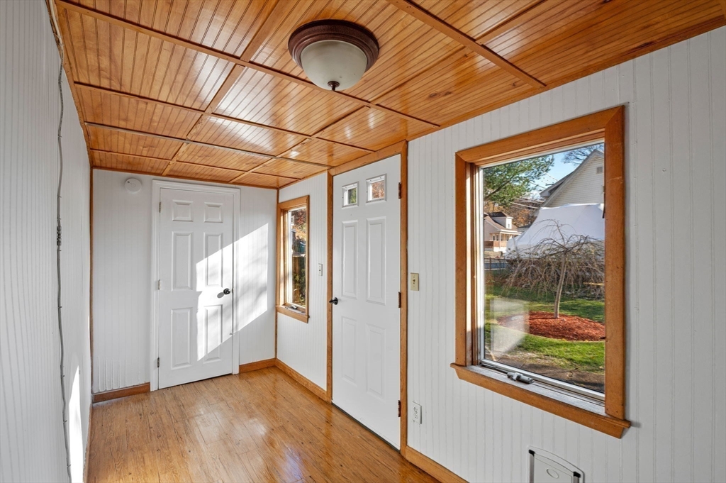 268 Walnut Street Lynn, MA 01905 - Photo 26 of 41 an empty room with wooden floor and windows
