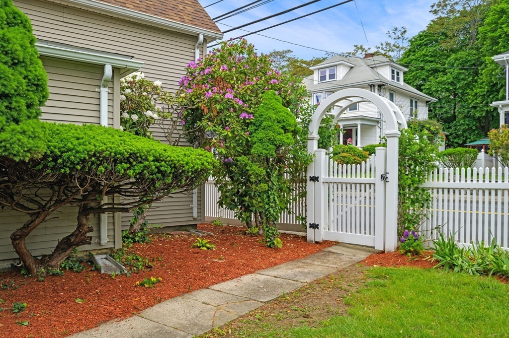 268 Walnut Street Lynn, MA 01905 - Photo 33 of 42 a front view of a house with garden