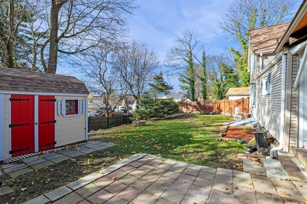 268 Walnut Street Lynn, MA 01905 - Photo 36 of 42 a view of a house with a yard