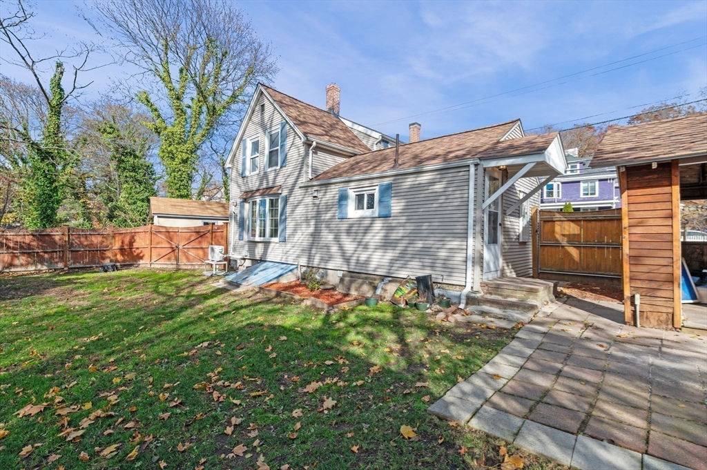 268 Walnut Street Lynn, MA 01905 - Photo 38 of 42 a view of a house with a yard