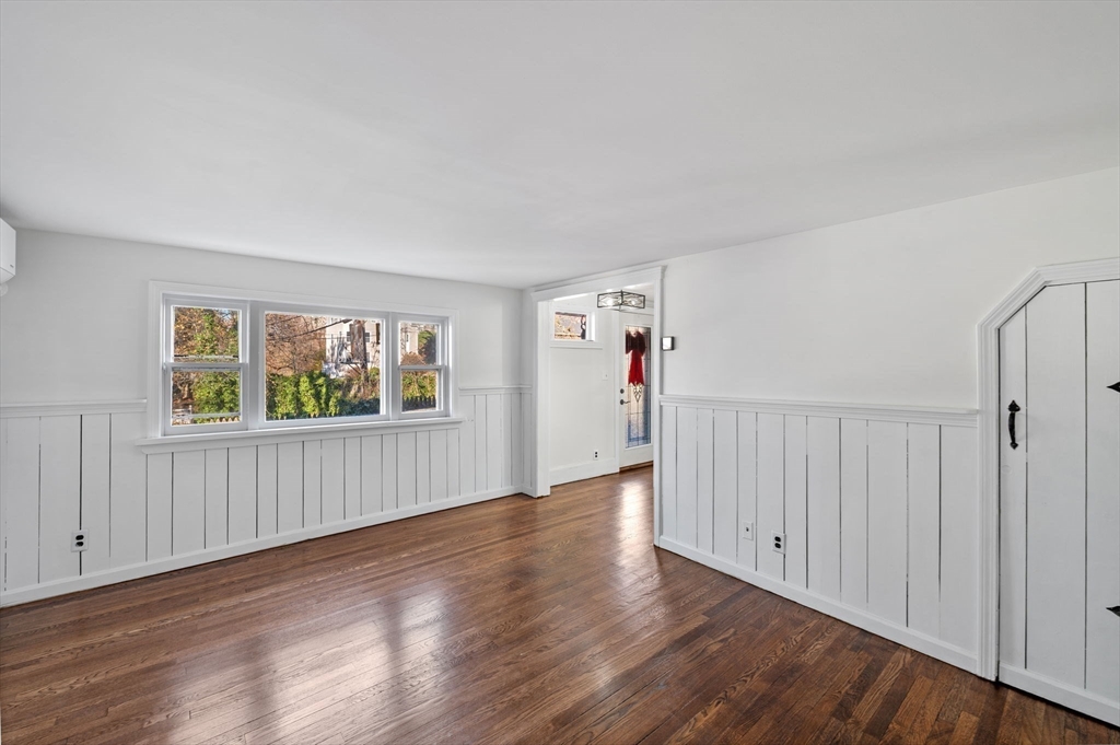 268 Walnut Street Lynn, MA 01905 - Photo 4 of 41 an empty room with wooden floor and windows