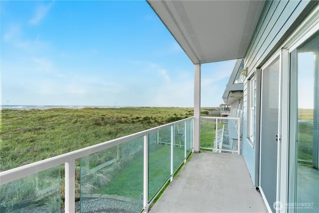 a view of a balcony with an outdoor space