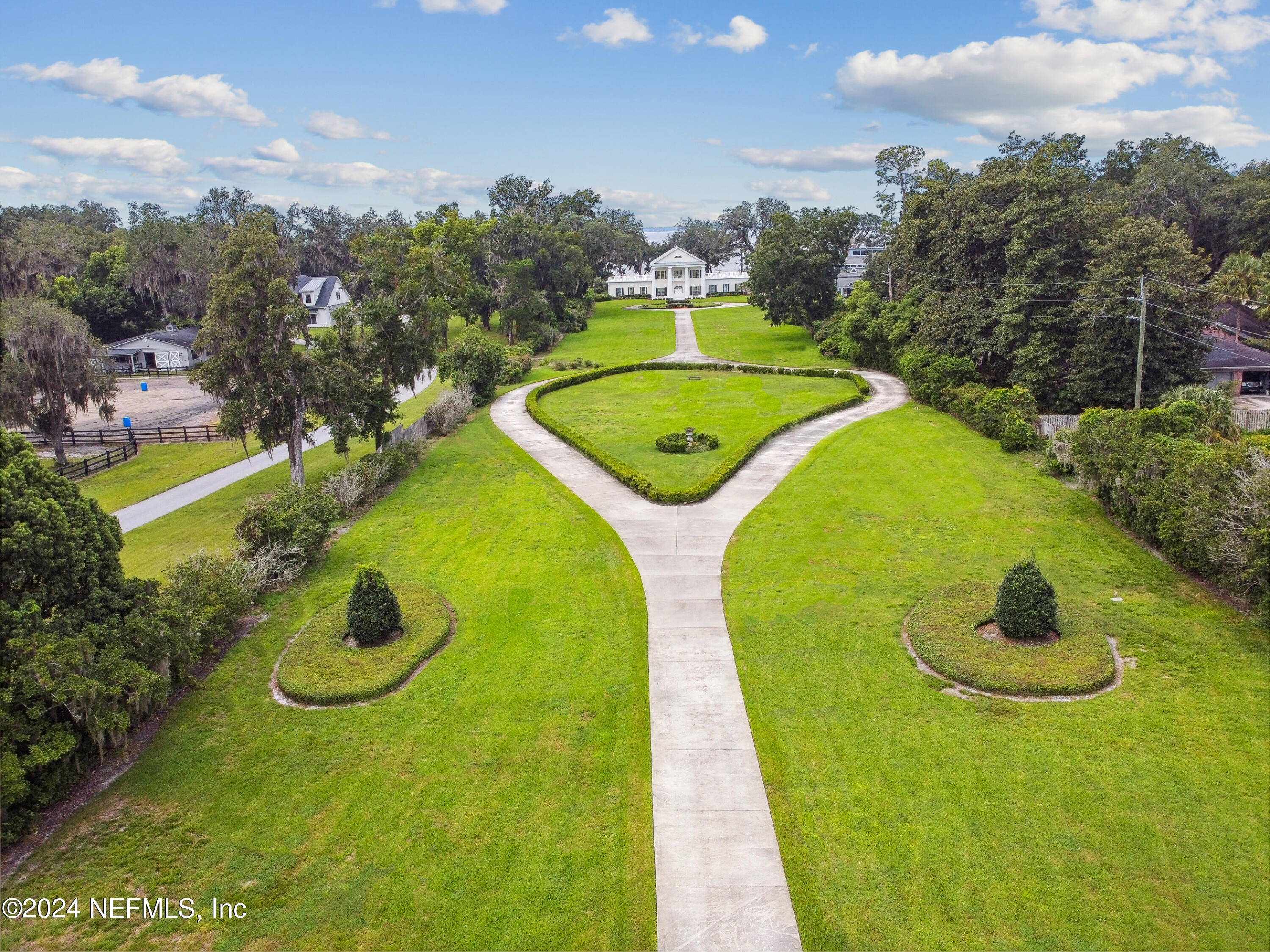 13936 Mandarin Road Jacksonville, FL 32223 - Photo 11 of 86 a view of a swimming pool with a yard and plants