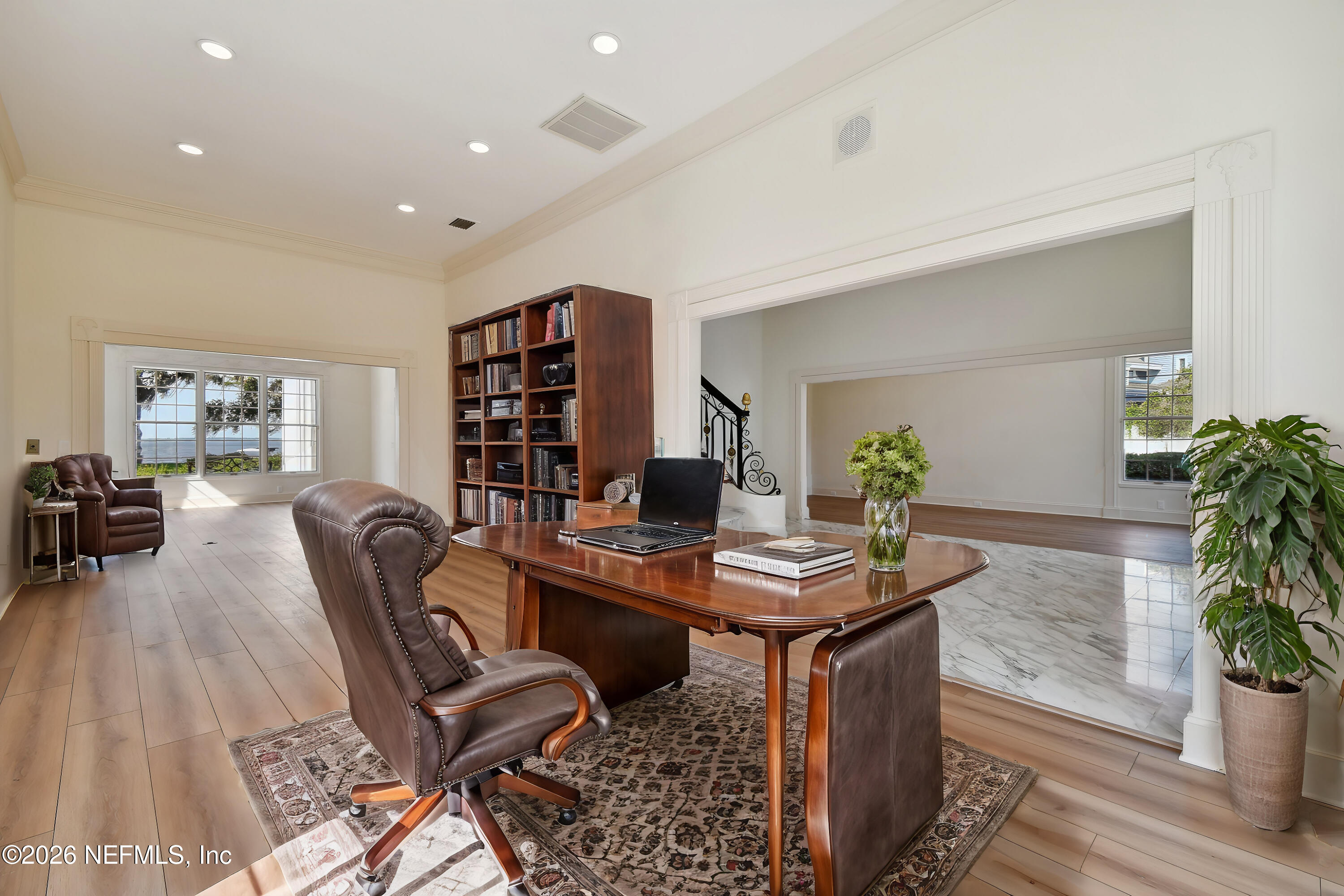 13936 Mandarin Road Jacksonville, FL 32223 - Photo 7 of 86 a workspace with furniture and potted plants