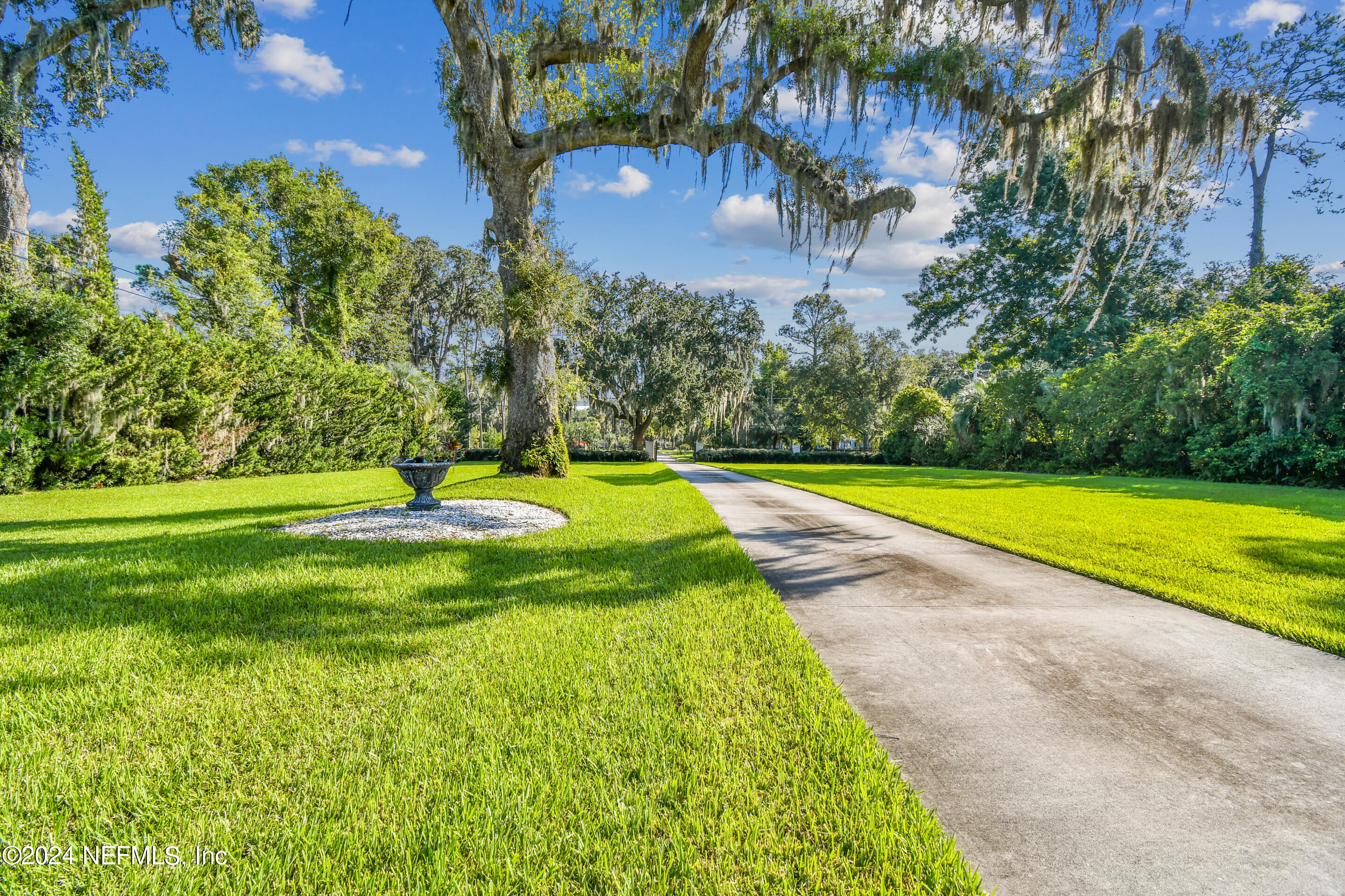 13936 Mandarin Road Jacksonville, FL 32223 - Photo 75 of 86 a view of a swimming pool with a yard