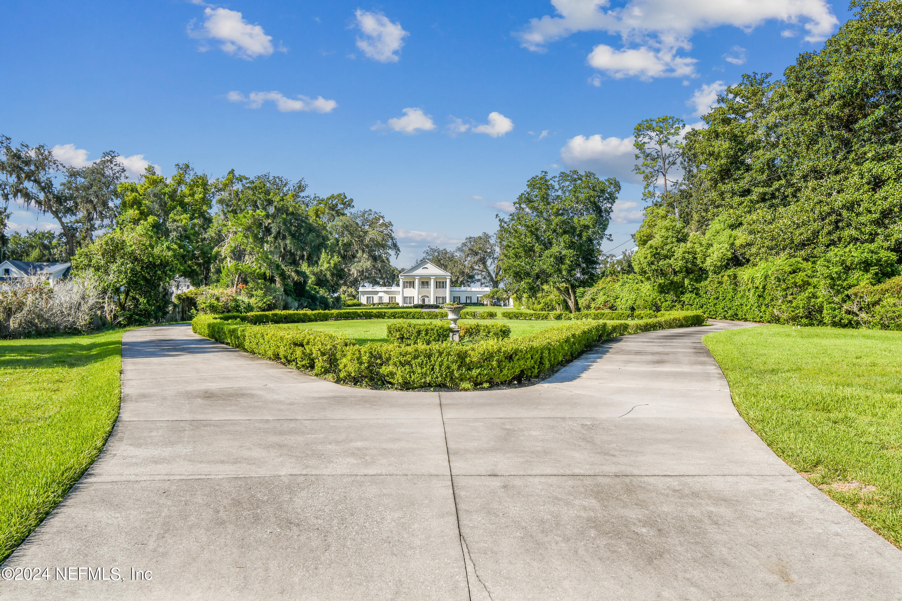 13936 Mandarin Road Jacksonville, FL 32223 - Photo 77 of 86 a view of a garden with a fountain