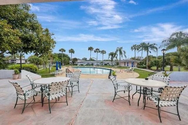 a view of a house with a swimming pool