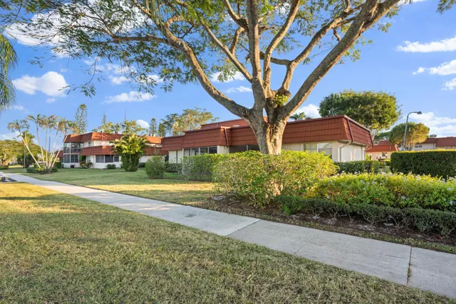 a view of a house with a garden