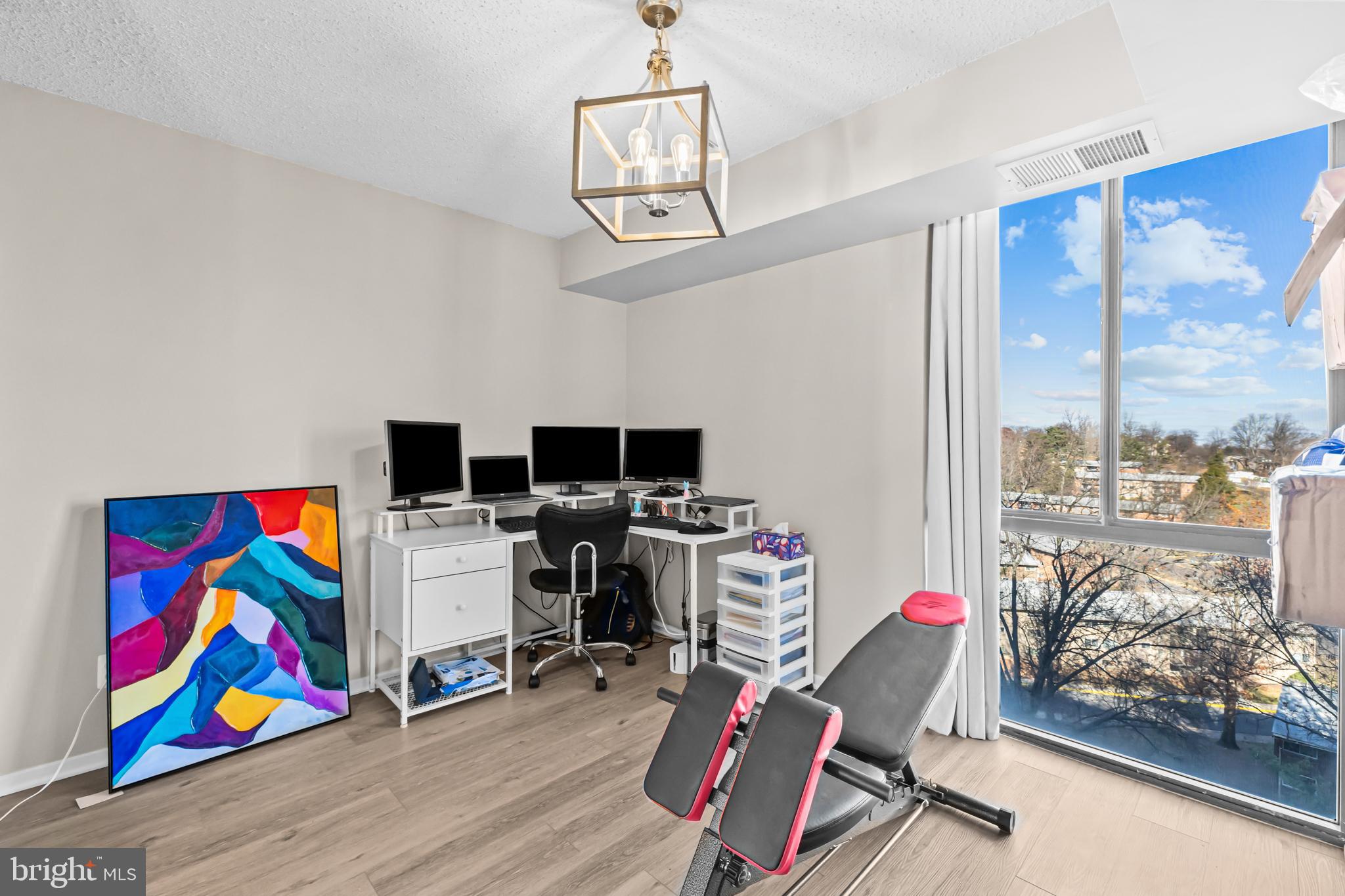 2300 Pimmit Drive, Unit 807 Falls Church, VA 22043 - Photo 14 of 33 a view of a workspace with furniture and a window