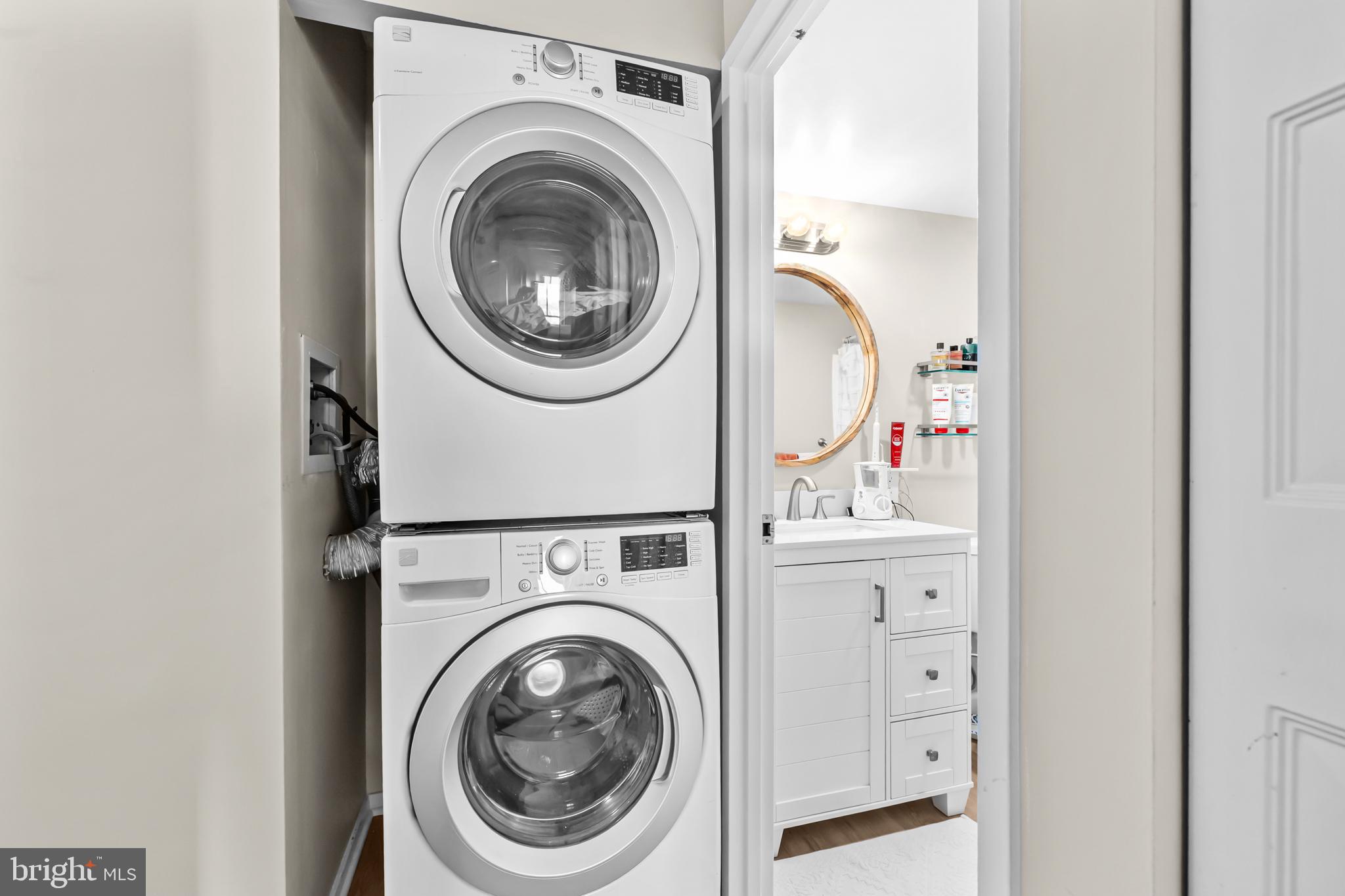 2300 Pimmit Drive, Unit 807 Falls Church, VA 22043 - Photo 22 of 33 a utility room with dryer and washer