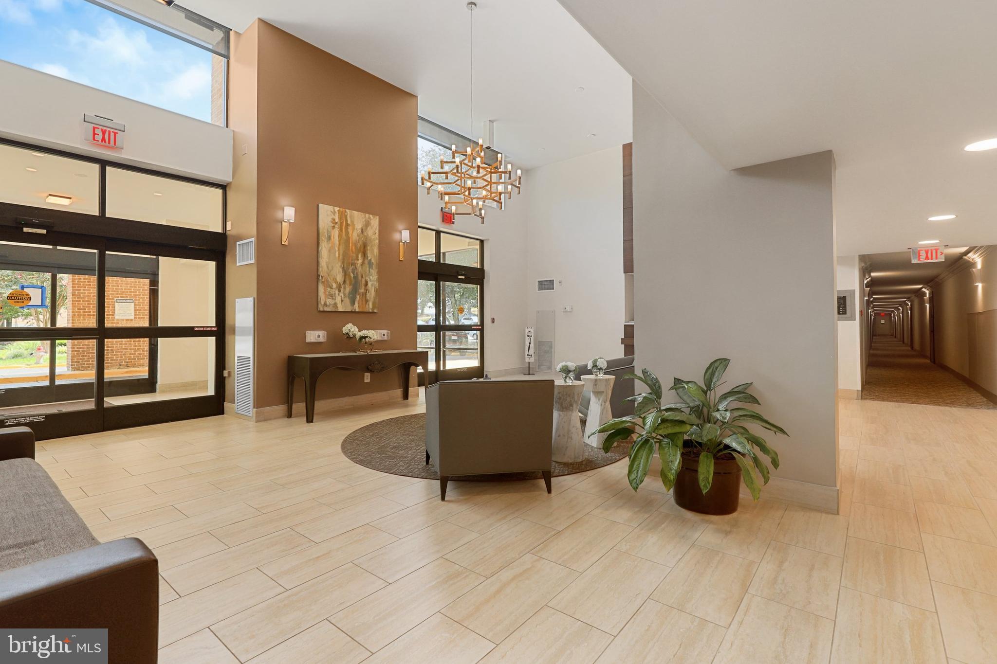 2300 Pimmit Drive, Unit 807 Falls Church, VA 22043 - Photo 3 of 33 a living room with furniture and a large window