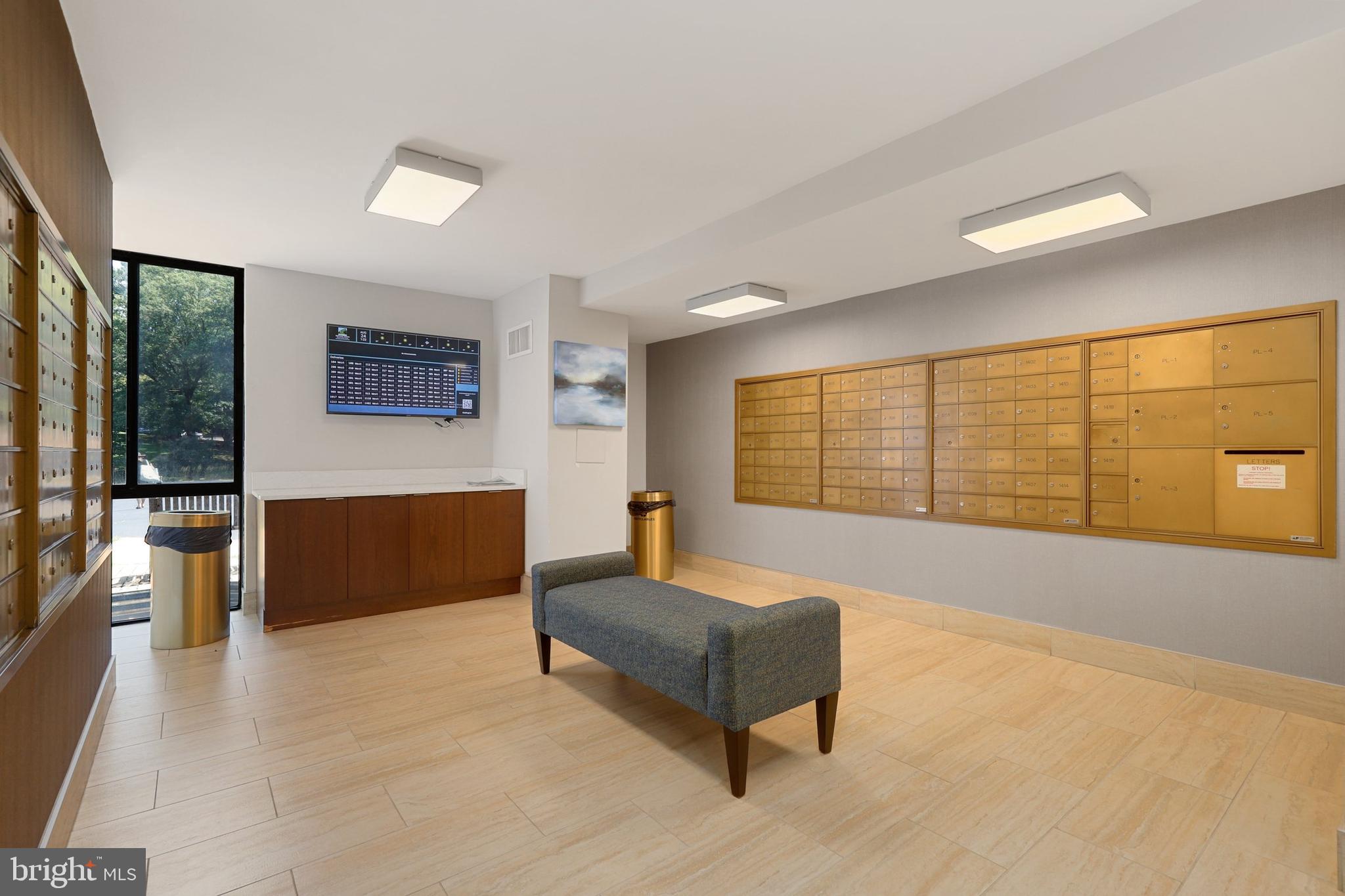 2300 Pimmit Drive, Unit 807 Falls Church, VA 22043 - Photo 4 of 33 a living room with furniture and large window