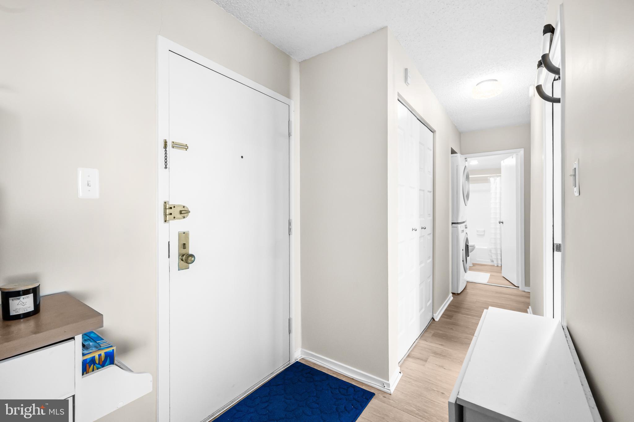 2300 Pimmit Drive, Unit 807 Falls Church, VA 22043 - Photo 6 of 33 a view of a hallway with wooden floor