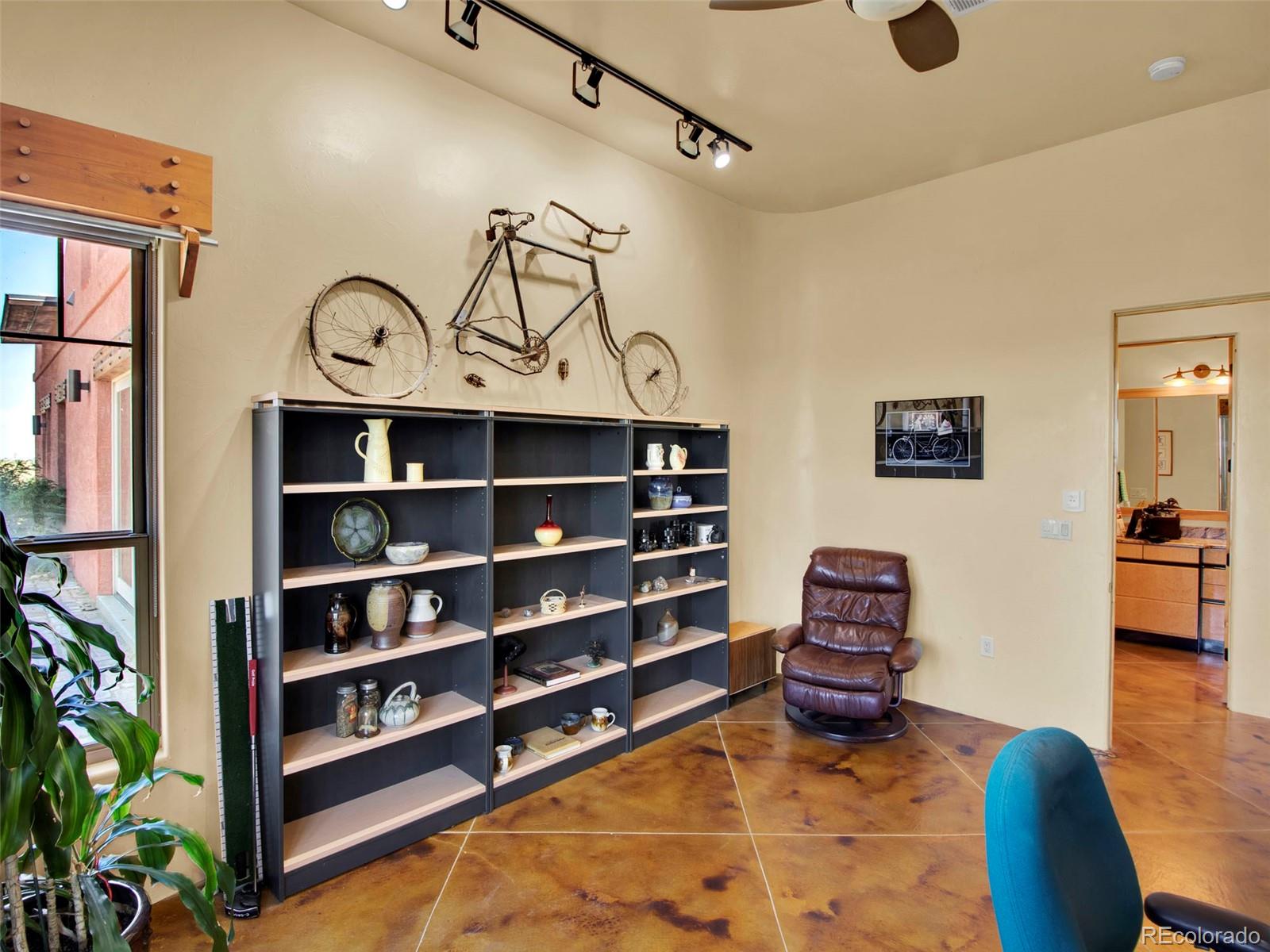 5549 Yulle Road Bennett, CO 80102 - Photo 35 of 47 a view of a livingroom with furniture and staircase