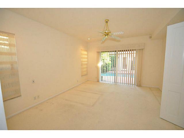 6293 Northwest 23rd Road Boca Raton, FL 33434 - Photo 13 of 25 a view of an empty room with a window