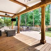 a patio view with a table and chairs